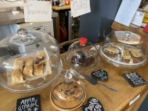 A display of homemade vegan cakes and pastries.